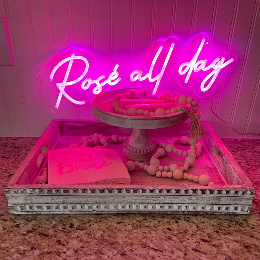 Rosé all day pink neon party sign.